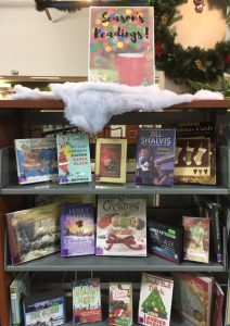 Season's Reading holiday book display at the library for December